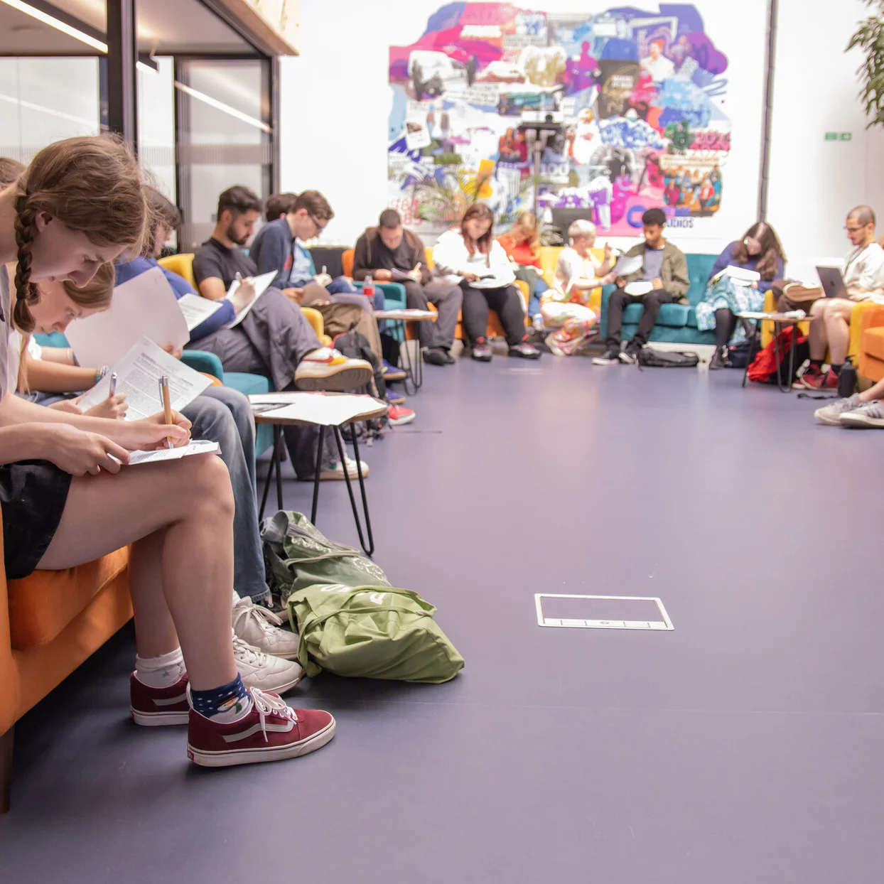 group of people participating in a screenwriting workshop